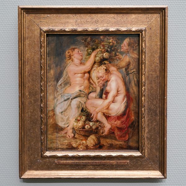 Peter Paul Rubens - Een sater die druiven perst met een tijger en een luipaard - Olieverf op paneel, 1625-1628