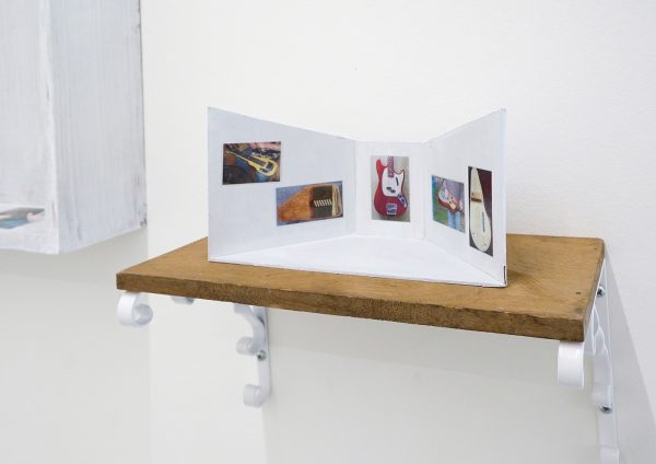 Indigo Deijmann - Timothee Chalamet - 60x45x10cm Olieverf op hout en inkjetprints & Musee des instruments de Musique - 34x34x16cm Hout, karton, metaal en inkjetprints (detail)