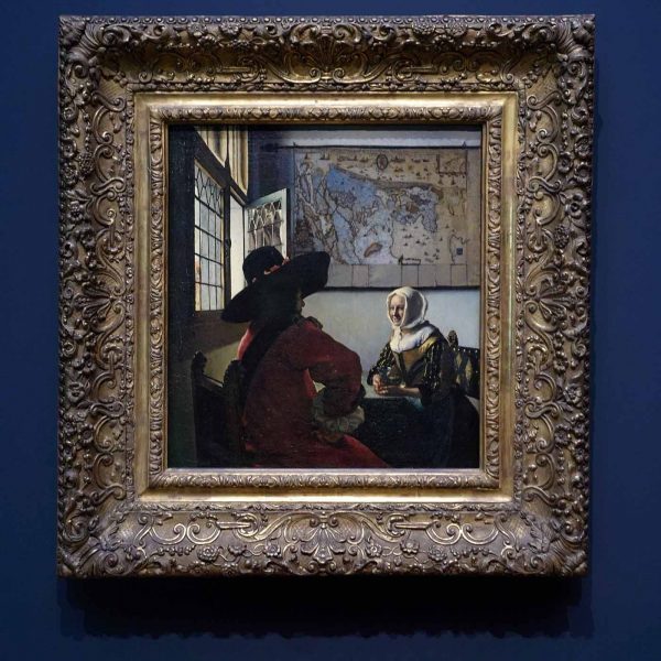 Johannes Vermeer - De soldaat en het lachende meisje - 51x46cm, Olieverf op doek, circa 1657-1658