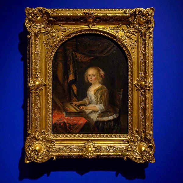 Gerard Dou - Jonge vrouw bespeelt een klavechord - Olieverf op paneel, circa 1665