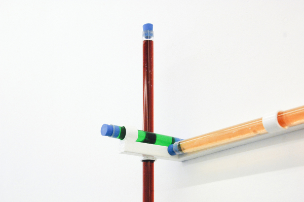 Anne de Vries - At Strani Venice - 225x120x35cm Aperol Spirits, Chianti, Piatti Detergenti, acrylaat buizen, rubberen kurken, roestvrij staal en verf (detail)