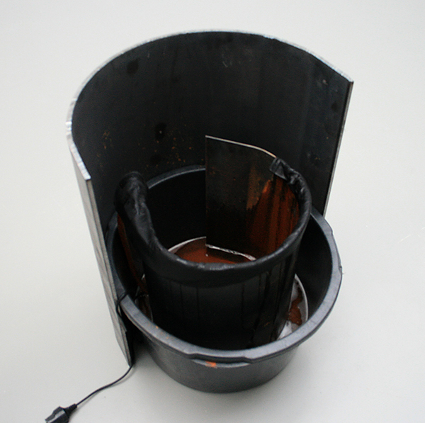 Olga Balema - Subscribing Is Better - 74x64cm Plastic box, staal, waterpomp en textiel