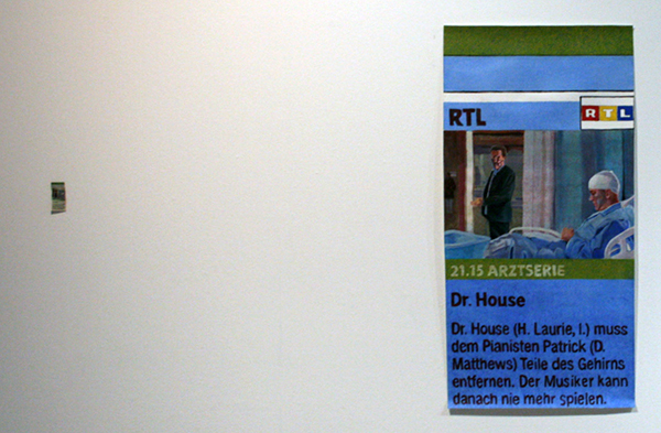 Peter Feiler - Dr Weishaupt muss dem Patienten Goliath Teile des Gehims entfermen, Der Demokrat kann danach nie mehr wahlen - 7x3cm & 86x42cm Krant & acrylverf op papier