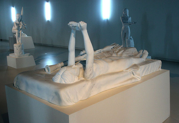 Thom Puckey - Figure on Bed with Camera and Weapons - Marmer