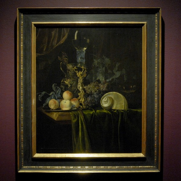 Willem van Aelst (?) - Stilleven met siervaatwerk, nautisschelp en vruchten op een donker kleed - Olieverf op doek, 1659